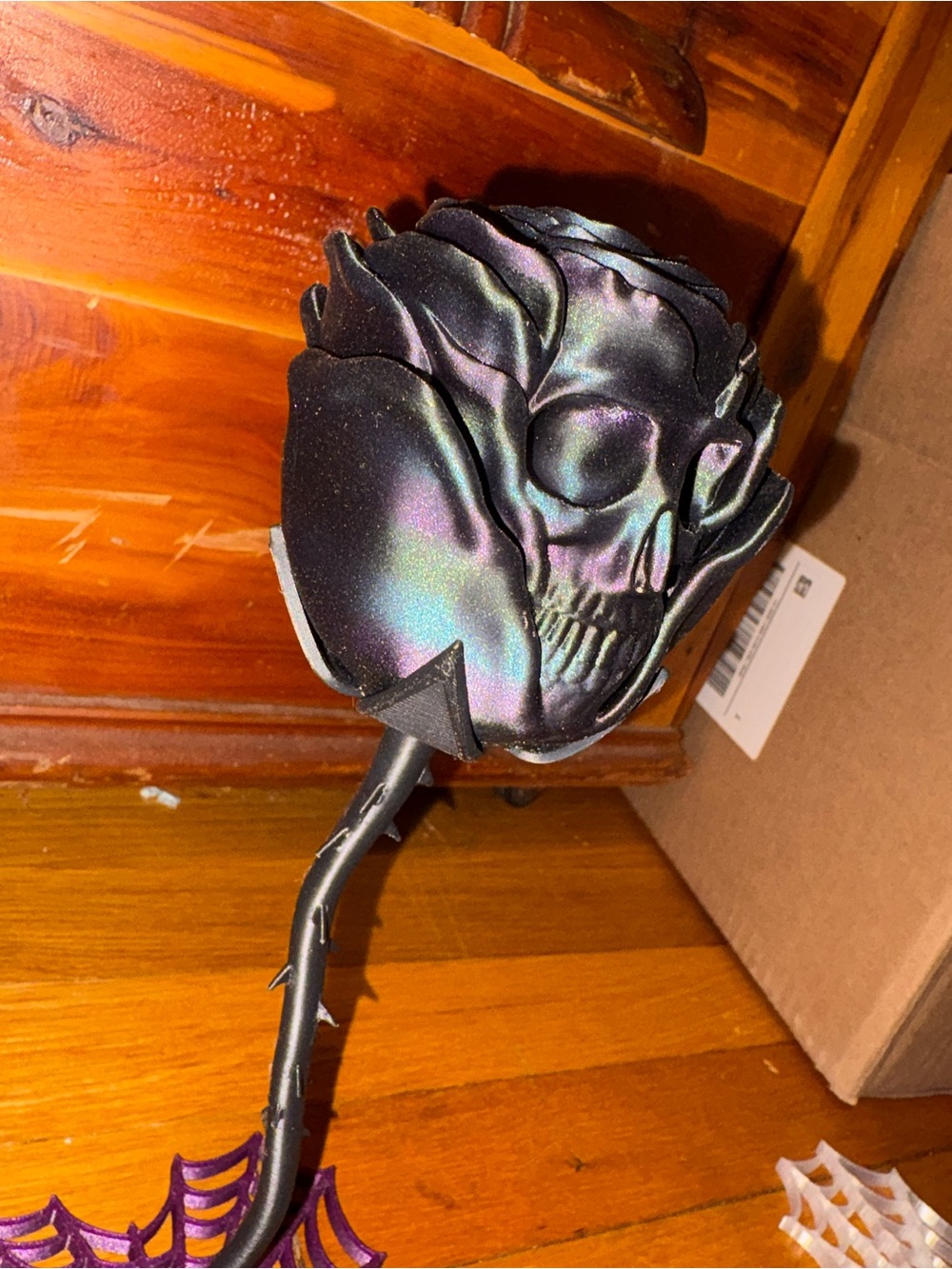 Oil slick black rose skull decor